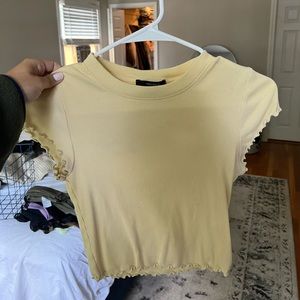 Yellow cropped shirt